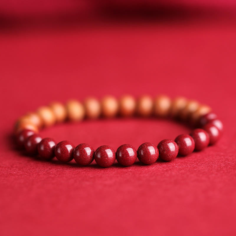 Peach Wood and Cinnabar Bead Bracelet