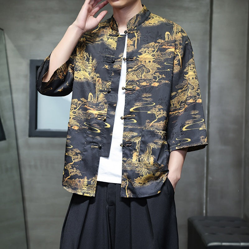 Man wearing a black three-quarter sleeve Tang suit shirt with gold dragon print
