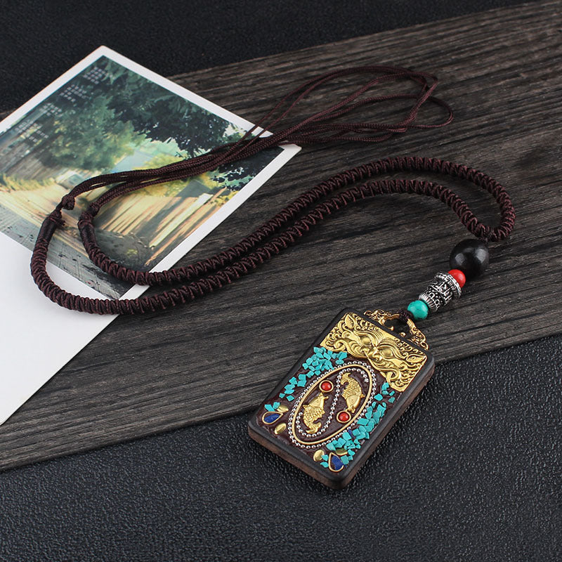 Ebony Wood Pendant Necklace with Buddhist Symbols