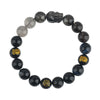 Black beaded bracelet with gold accents and a carved Pixiu charm