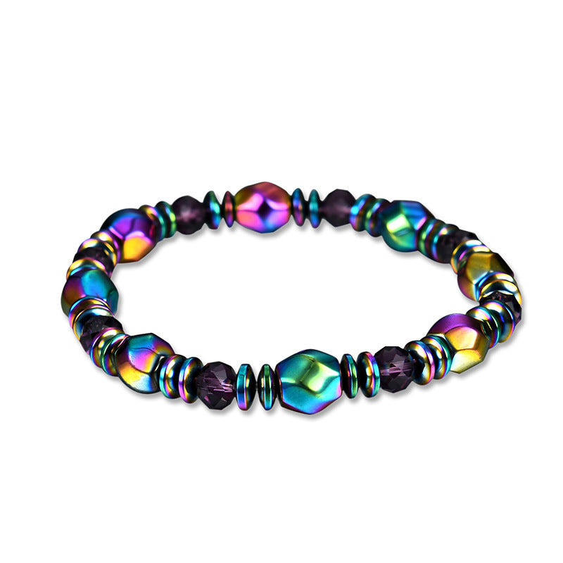 Rainbow Hematite Wellness Bracelet with geometric beads on a white background