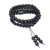 Multi-strand black obsidian mala bracelet with 108 beads worn on wrist