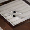 Silver Tone Floral Drop Earrings with Black Beads