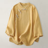 Yellow relaxed linen blend top with traditional knot buttons