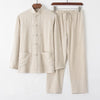 Beige long sleeve Tang suit jacket and matching drawstring pants laid flat on white background