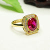 Lab-Created Ruby Ring with Geometric Halo Setting