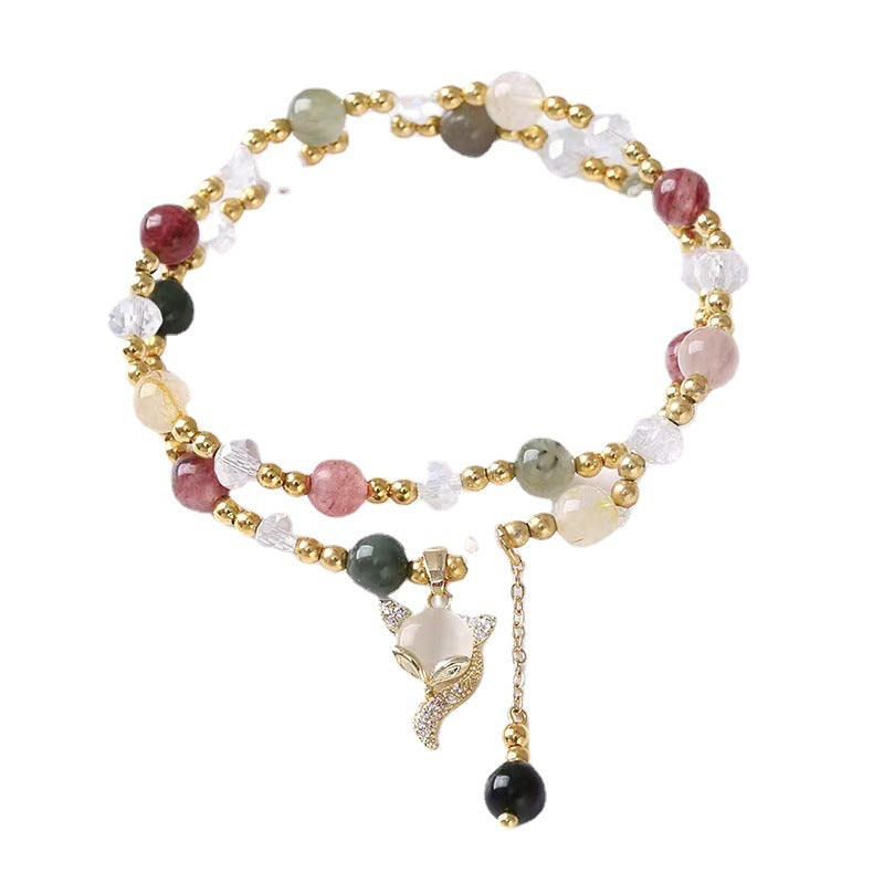Double wrap bracelet with multicolored rutilated quartz beads and a gold fox charm