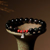 Black Obsidian and Cinnabar Lotus Pod Bracelet