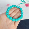 Turquoise Bracelet with Tibetan Style Beads and Charm
