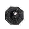 Close up of an octagonal black obsidian pendant with silver-tone trigrams and a central Yin Yang symbol