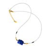 Geometric blue lapis lazuli pendant on a clear quartz beaded necklace