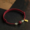 Cinnabar and Hetian Jade Red String Bracelet with Fu Charm