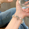 Interlocking Peace Buckle Bracelet, Faux Jade Beads