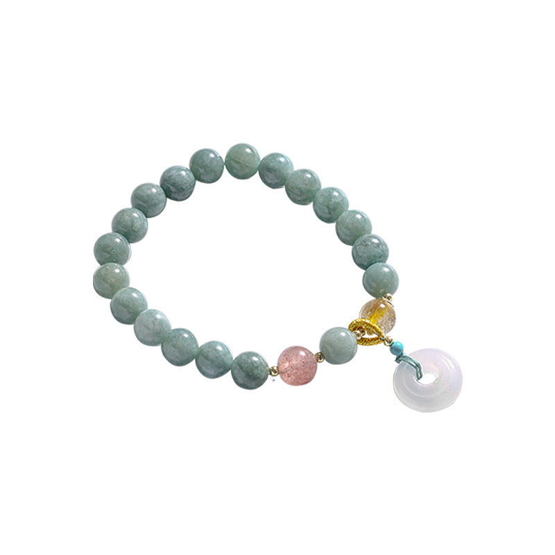A silver-tone chain bracelet with colorful beads and a white circular charm