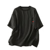 Black women's cotton t-shirt with a small red heart embroidered on the front pocket
