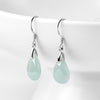 Pair of sterling silver dangle earrings with light green water drop jade stones