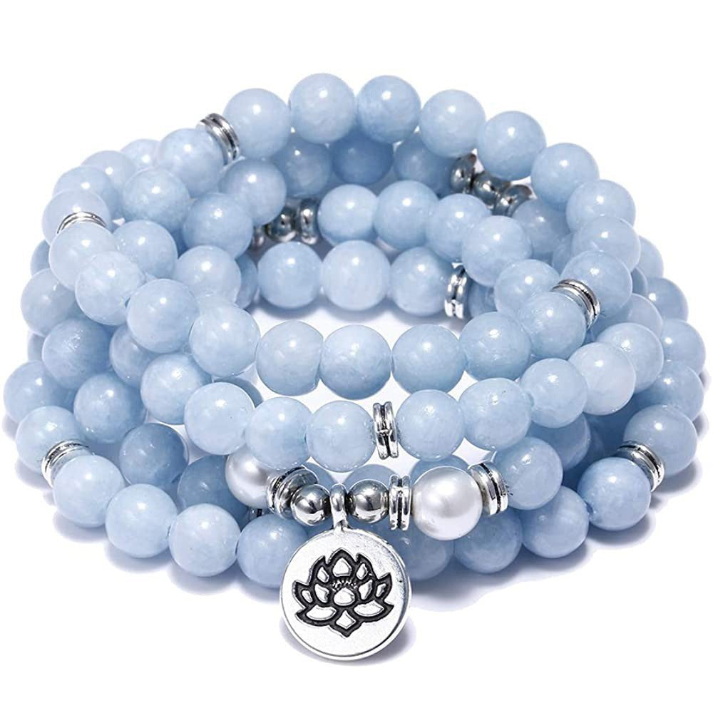 Light blue 108 bead mala bracelet with a silver lotus charm