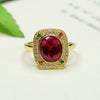 Lab-Created Ruby Ring with Geometric Halo Setting