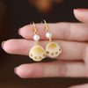 Bodhi Seed Cat Paw Earrings with Gold-Tone Hook