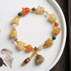 Golden Silk Jade Gourd Charm Bracelet