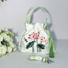 Embroidered Drawstring Bucket Bag with Tassel, Floral and Animal Motifs