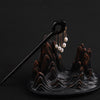 Black wooden hairpin with gold chains and white pearl drops