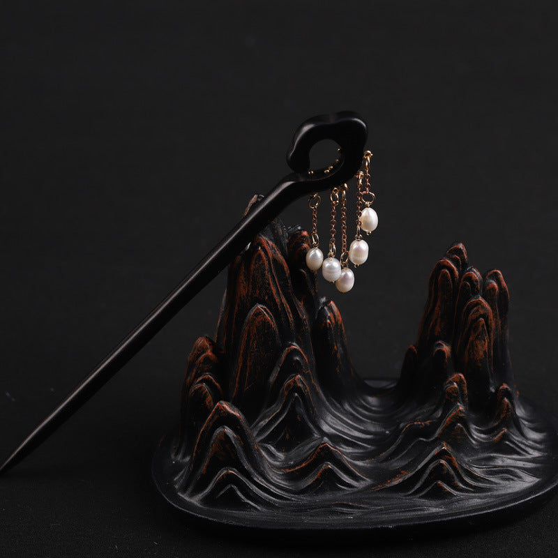 Black wooden hairpin with gold chains and white pearl drops