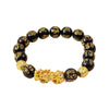 Gold-tone Pixiu charm on black obsidian bead bracelet with mantra engravings