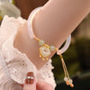 Interlocking Peace Buckle Bracelet, Faux Jade Beads