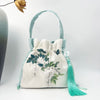 Embroidered Drawstring Bucket Bag with Tassel, Floral and Animal Motifs