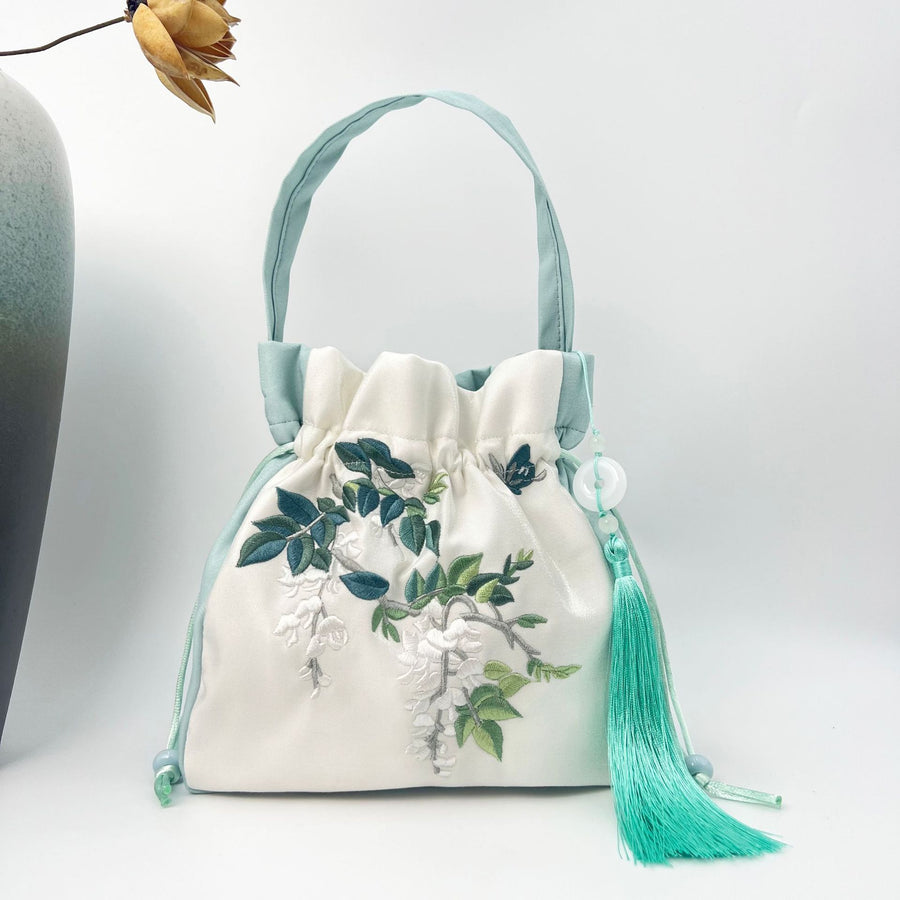 Embroidered Drawstring Bucket Bag with Tassel, Floral and Animal Motifs