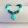 Luminous Lotus Bracelet with Turquoise Glowstone Beads