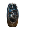 Blue and brown ceramic waterfall backflow incense burner with smoke cascading down