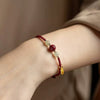 Cinnabar and Hetian Jade Red String Bracelet with Fu Charm