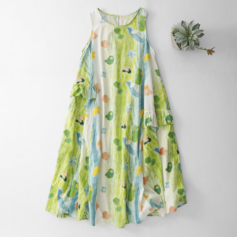 Front view of a long sleeveless dress with green and blue watercolor floral print