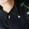 White Elephant Pendant Necklace with Lotus Charm, Silver Tone