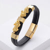 Black leather bracelet with two gold-tone Pixiu figures and a magnetic clasp