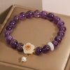 Amethyst Bracelet with White Flower and Pearl Charm