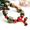 Nine-Eye Dzi Bead Black Agate Bracelet